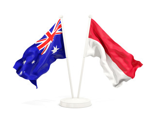 Two waving flags of Australia and indonesia