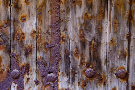 rusty metal with wooden door detail background, old wooden rusty metal door with lock, Backgrounds Textures wood door, Ancient architecture doornail 