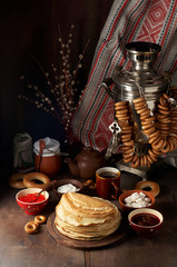 Shrovetide Maslenitsa Butter Week festival meal. Stack of russian pancakes blini