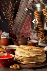 Shrovetide Maslenitsa Butter Week festival meal. Stack of russian pancakes blini