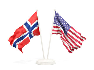 Two waving flags of norway and United States