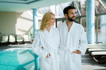 Portrait of attractive couple in spa center