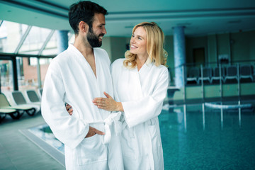 Portrait of attractive couple in spa center