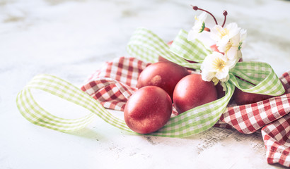 Easter background with red egg with flowers
