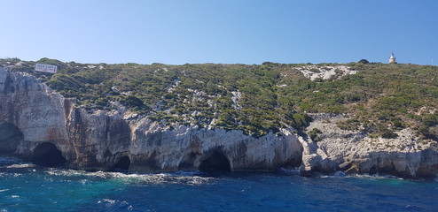 Skały wybrzeże port morze lazur błękit groty © Jarek