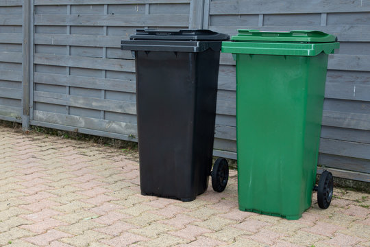 Collected kerbside waste bins on street