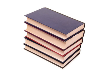 Old classic book and glasses on white background