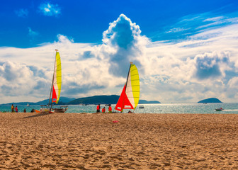 Two catamarans with its colorful sails