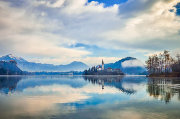 Fototapeta na wymiar View on Lake Bled with church island in Slovenia