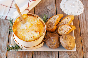 Mont d'or cheese. Traditional french  recipe - La boîte chaude. Delicious French Cheese. Mont-d'Or...