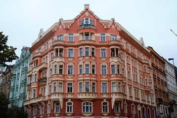Fototapeta na wymiar Street in Prague with colorful historical buildings