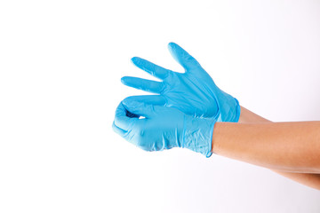 Human wearing glove on white background.	