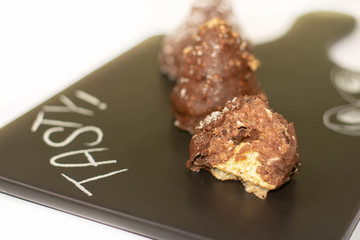 Three cone chocolate cakes on the tray