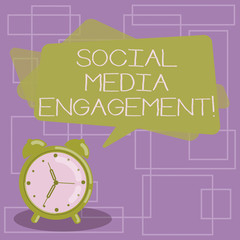 Text sign showing Social Media Engagement. Conceptual photo Communicating in an online community platforms Blank Rectangular Color Speech Bubble Overlay and Analog Alarm Clock