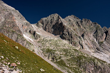 Panoramic view of the rock faces of Monte Cassina Baggio in the upper Bedretto valley in Switzerland
