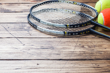 Tennis Ball and rackets on Wood Background, Sport Concept and Idea, Rustic Style.