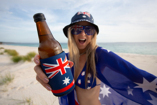 Woman celebrate Australia Day with beer