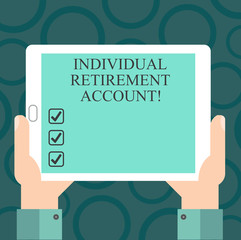 Writing note showing Individual Retirement Account. Business photo showcasing Invest and earmark funds for retirement Hu analysis Hand Holding Tablet Smartphone Display Unit photo