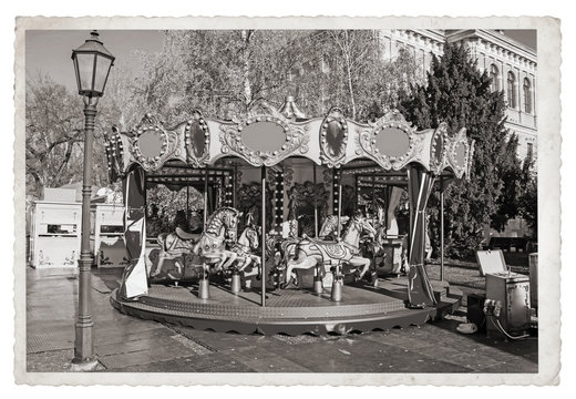 Old fashioned french carousel with horses Vintage Monochrome photo