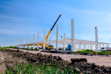 View on building site, unfinished concrete edifice.