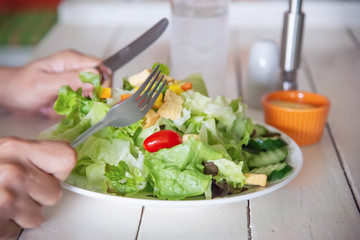 Man ready to eat vegetable salad - people with clean fresh healthy food concept