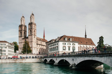 Old Grossmunster cathedral and munsterbrucke in Zurich Old town Altstadt