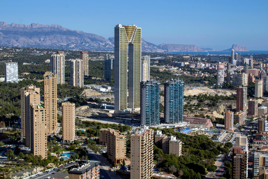 Aerial photo showing the whole of Benidorm in Alicante, you can see everywhere included Playa de Levante beach, Balcón del Mediterráneo and all the high rise hotels. © Duncan