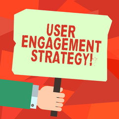 Conceptual hand writing showing User Engagement Strategy. Business photo text Enhancing the job perforanalysisce of individuals Hu analysis Hand Holding Colored Placard with Stick Text Space