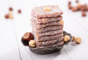 Cezerye sweets dessert. Carrot Traditional Turkish dessert (Mersin a special dessert, Turkey) carrots, sugar, walnuts, hazelnuts, pistachios, and is made from coconut.