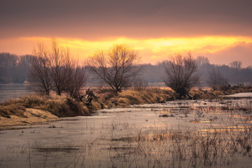 Sunrise over the causeway on the Vistula River somewhere in Poland