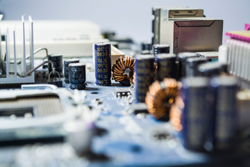 Texture. Background. Modern computer technologies. The old multi-colored motherboard with dust. Electronics. Repair.