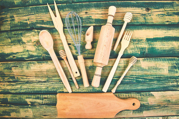 Cooking or baking food background with kitchen utensils