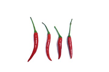 A group of red hot tropical chilli on white isolated background 