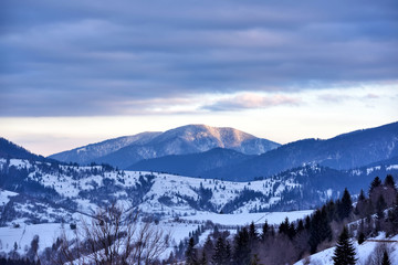 Naklejka na ściany i meble Beautiful mountain landscape. Frosty winter morning in the Carpathian