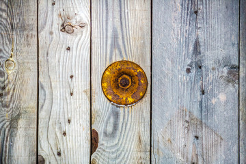 colored wood planks with bolts and marks