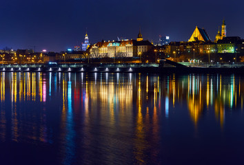 Fototapeta na wymiar Warsaw, Poland - March 21, 2017: Great panoramic night view of the center and the Old City of Warsaw from the right bank of the Vistula River