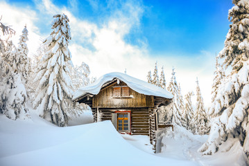 Chateau in the winter mountains, a hut in the snow. Winter mountain landscape. Karkonosze, Poland.