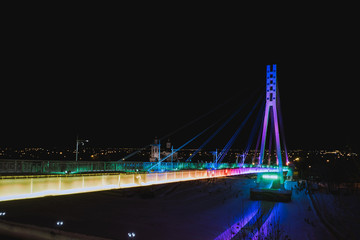 glowing bridge at night
