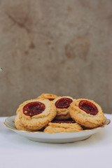 Thumbprint cookies filled with strawberry jam