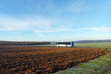 Bus and agricultural fields in &Icirc;le de France country 