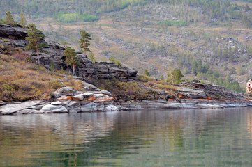 Summer landscape with lake and rocks