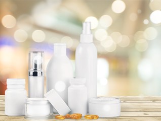 Set of cosmetic products on blurred background