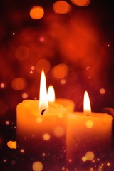 Obraz na płótnie Canvas Candles light. Christmas candles burning at night. Abstract