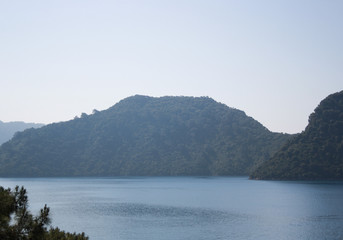 scenic and beautiful view on mountain and blue sea and sky