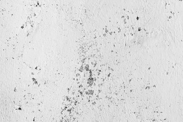 concrete wall with cracked whitewash