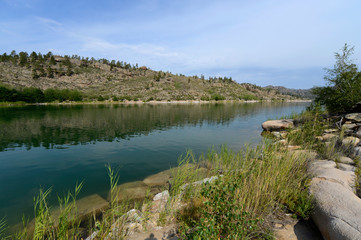 Fototapeta na wymiar Summer landscape with lake and rocks
