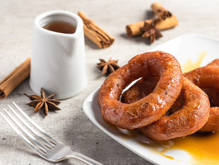 Peruvian classic dessert, picarones with honey