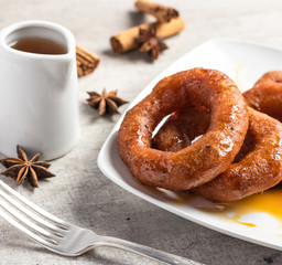 Peruvian classic dessert, picarones with honey