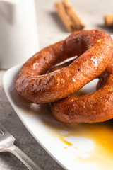Peruvian classic dessert, picarones with honey