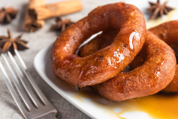 Peruvian classic dessert, picarones with honey
